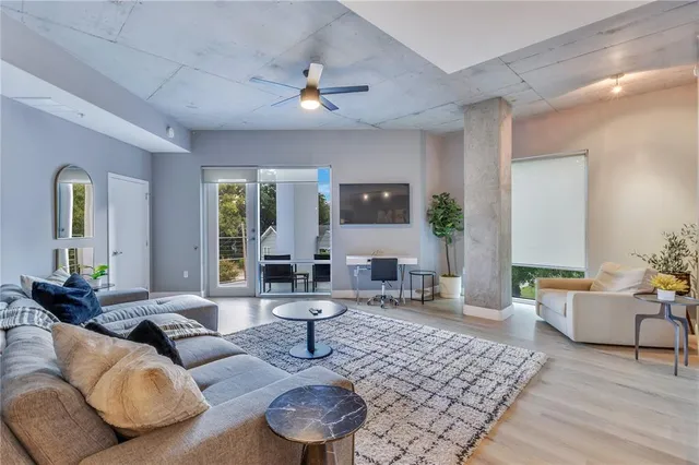 a workspace with furniture and window