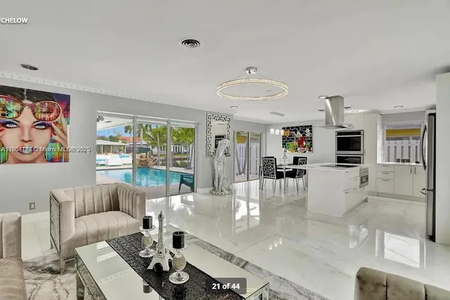 a bedroom with a bed and ceiling fan