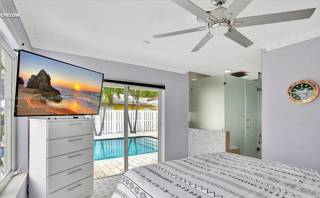 2321 Southeast 15th Street, Unit 2321 Pompano Beach, FL 33062 - Photo 26 of 26 a bedroom with a bed and a dresser