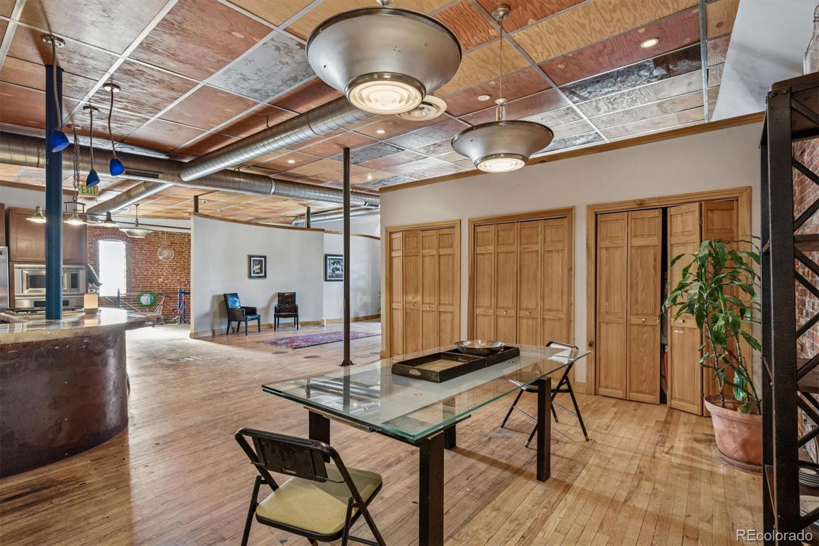 760 Santa Fe Drive, Unit 2 Denver, CO 80204 - Photo 16 of 33 a view of a livingroom with furniture and a ceiling fan