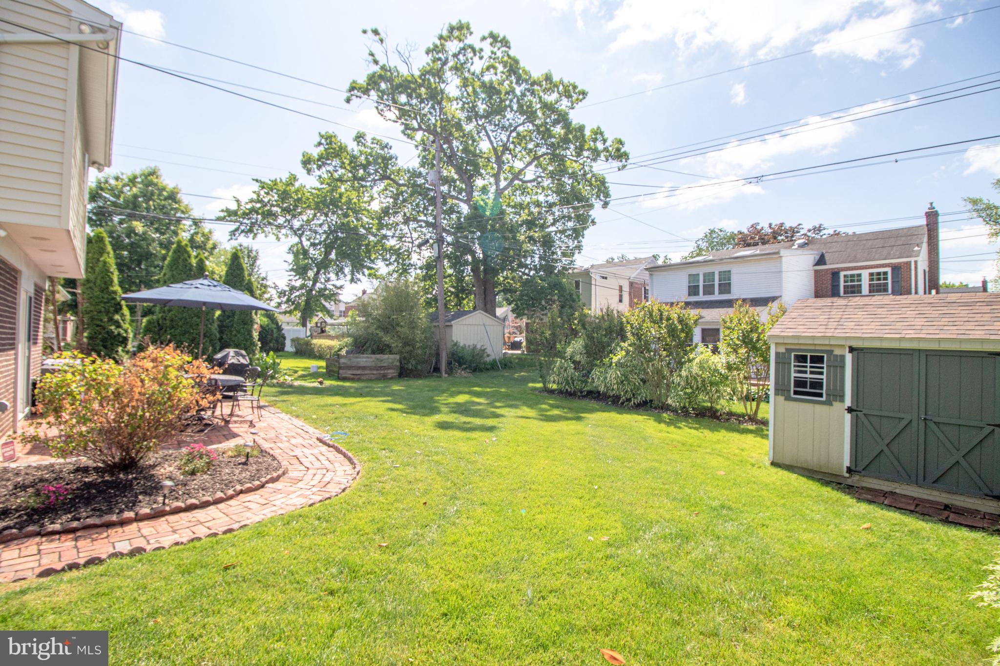202 Sandra Road Wilmington, DE 19803 - Photo 23 of 25 Backyard features great landscaping & storage shed