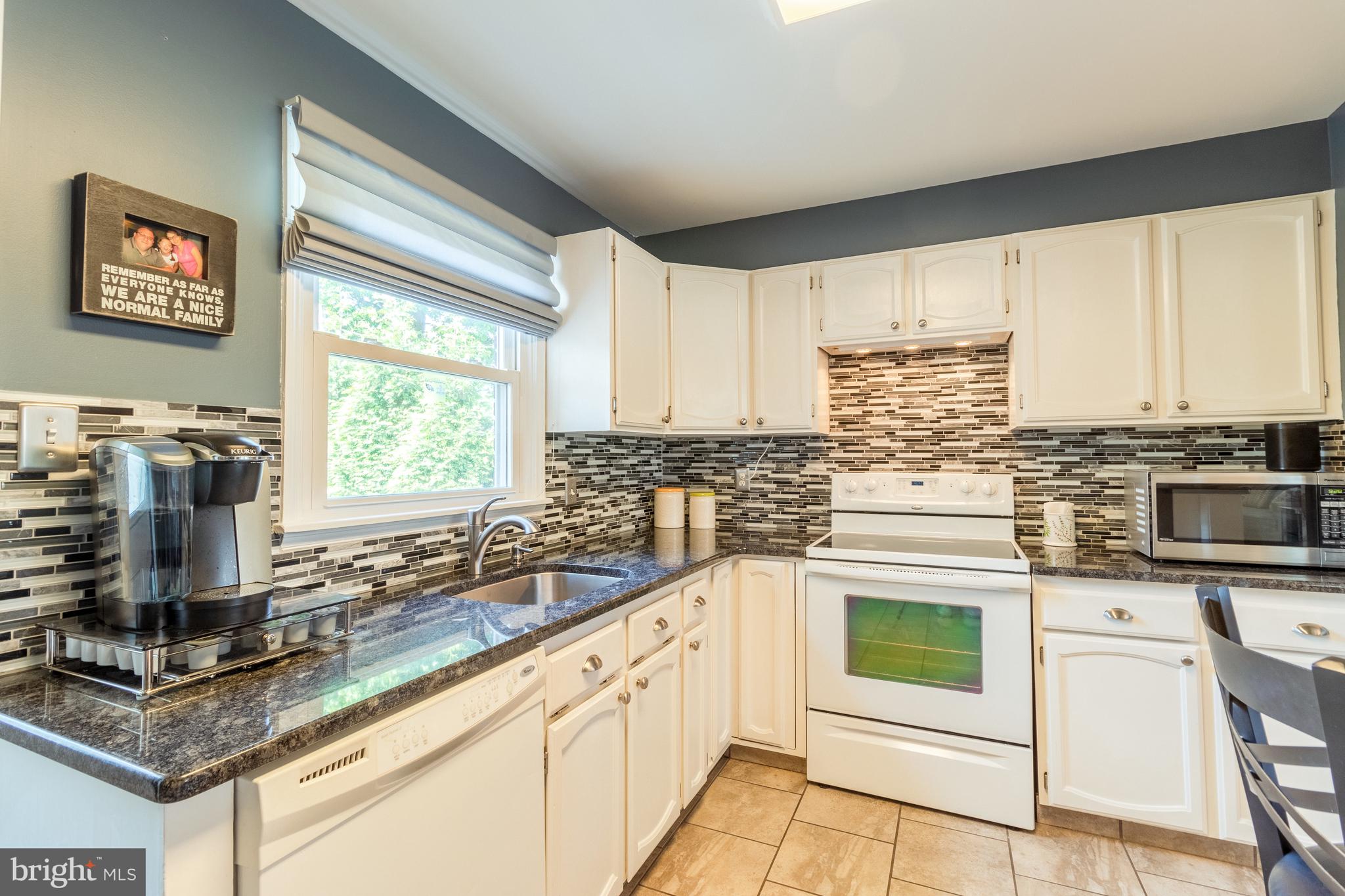 202 Sandra Road Wilmington, DE 19803 - Photo 10 of 25 Kitchen also has beautiful glass tile back splash