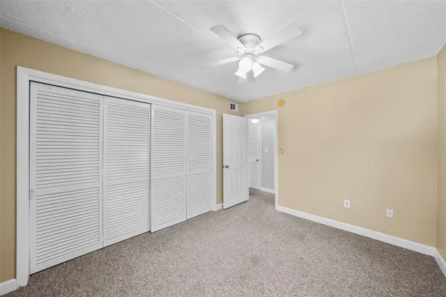 a view of balcony with wooden floor