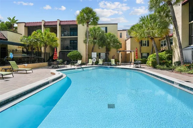 a view of outdoor space yard and swimming pool