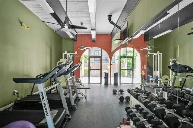 a view of house with swimming pool and furniture