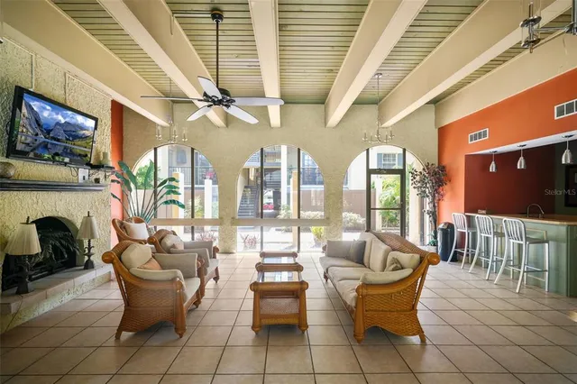 a view of a patio with couple of potted plants