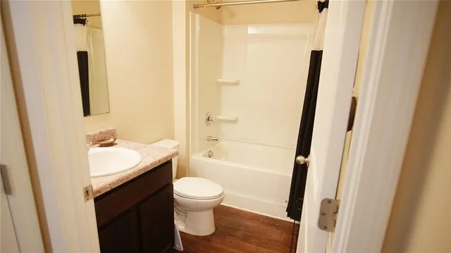 a backyard of a house with yard and outdoor seating