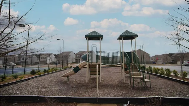 a view of an outdoor space and tennis court