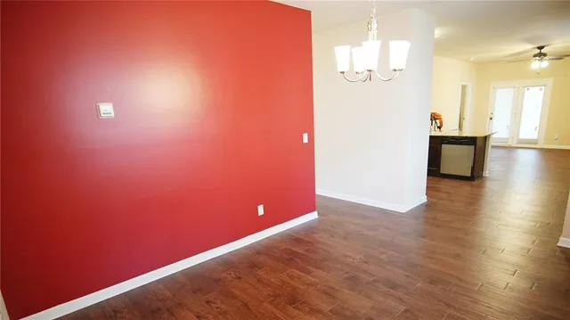 a view of a livingroom with wooden floor