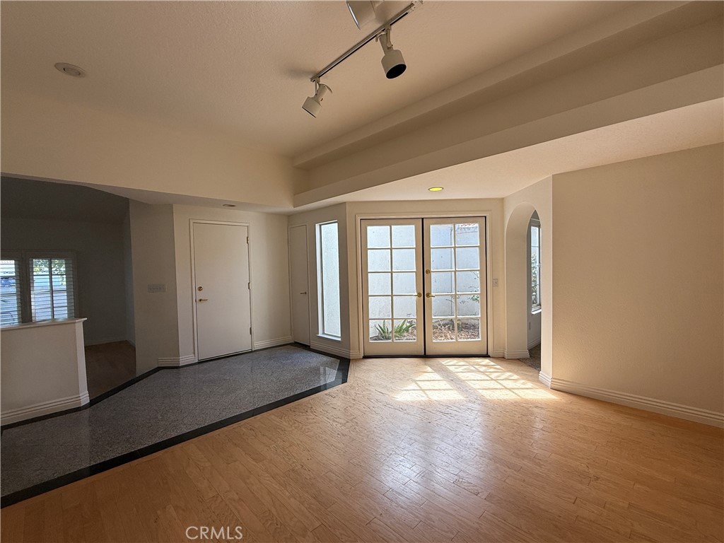 24315 Taranto Avenue Valencia, CA 91355 - Photo 7 of 21 a view of an empty room with a window