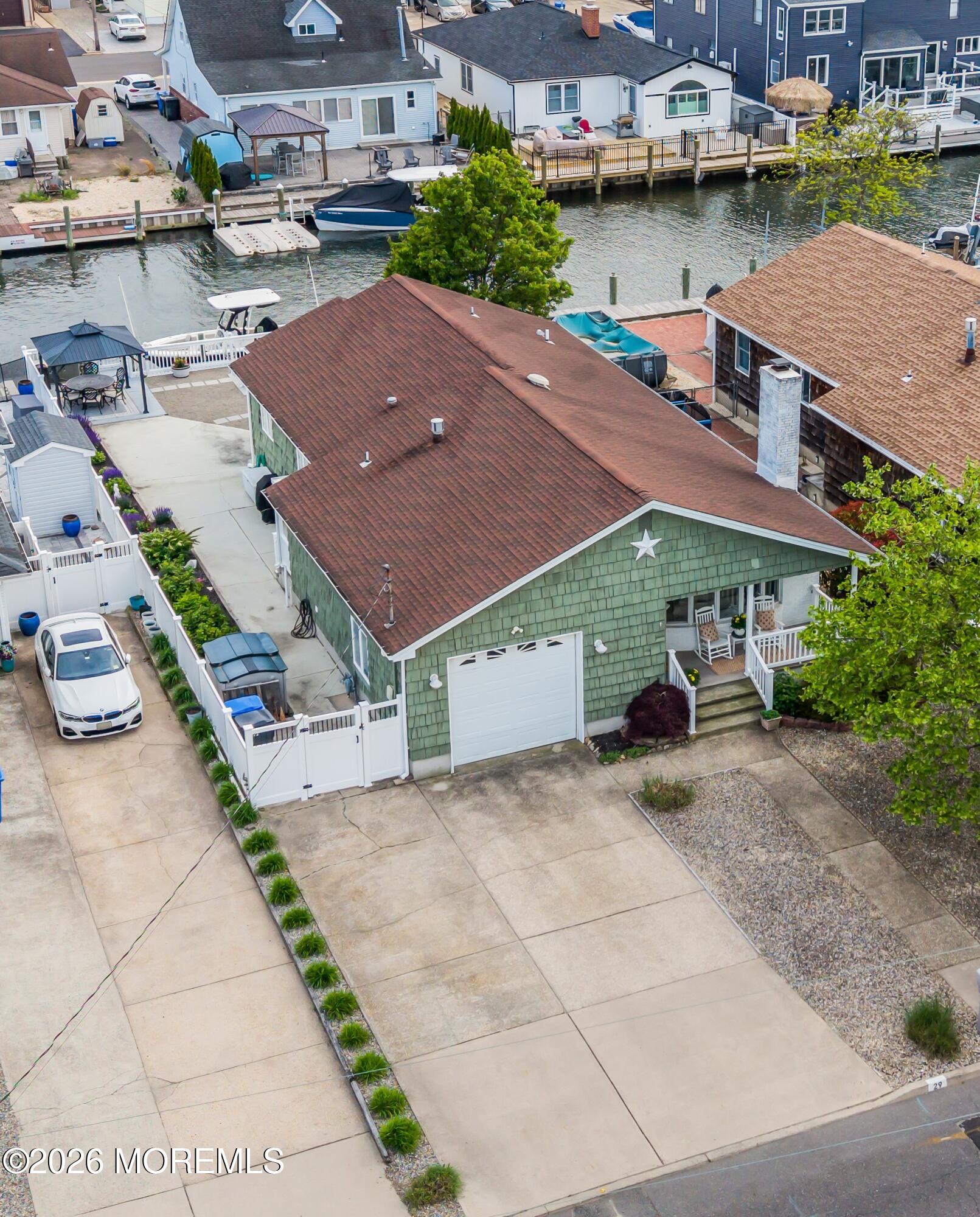 29 Green Island Road Toms River, NJ 08753 - Photo 1 of 63 an aerial view of a house with garden space and a patio