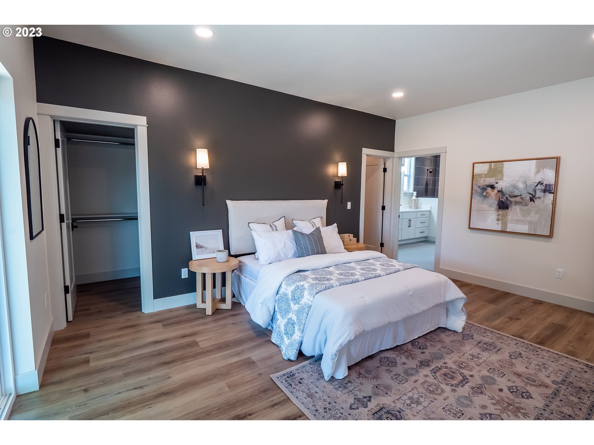 1050 Kintzley Avenue Springfield, OR 97478 - Photo 19 of 48 a bedroom with a bed and a painting on the wall