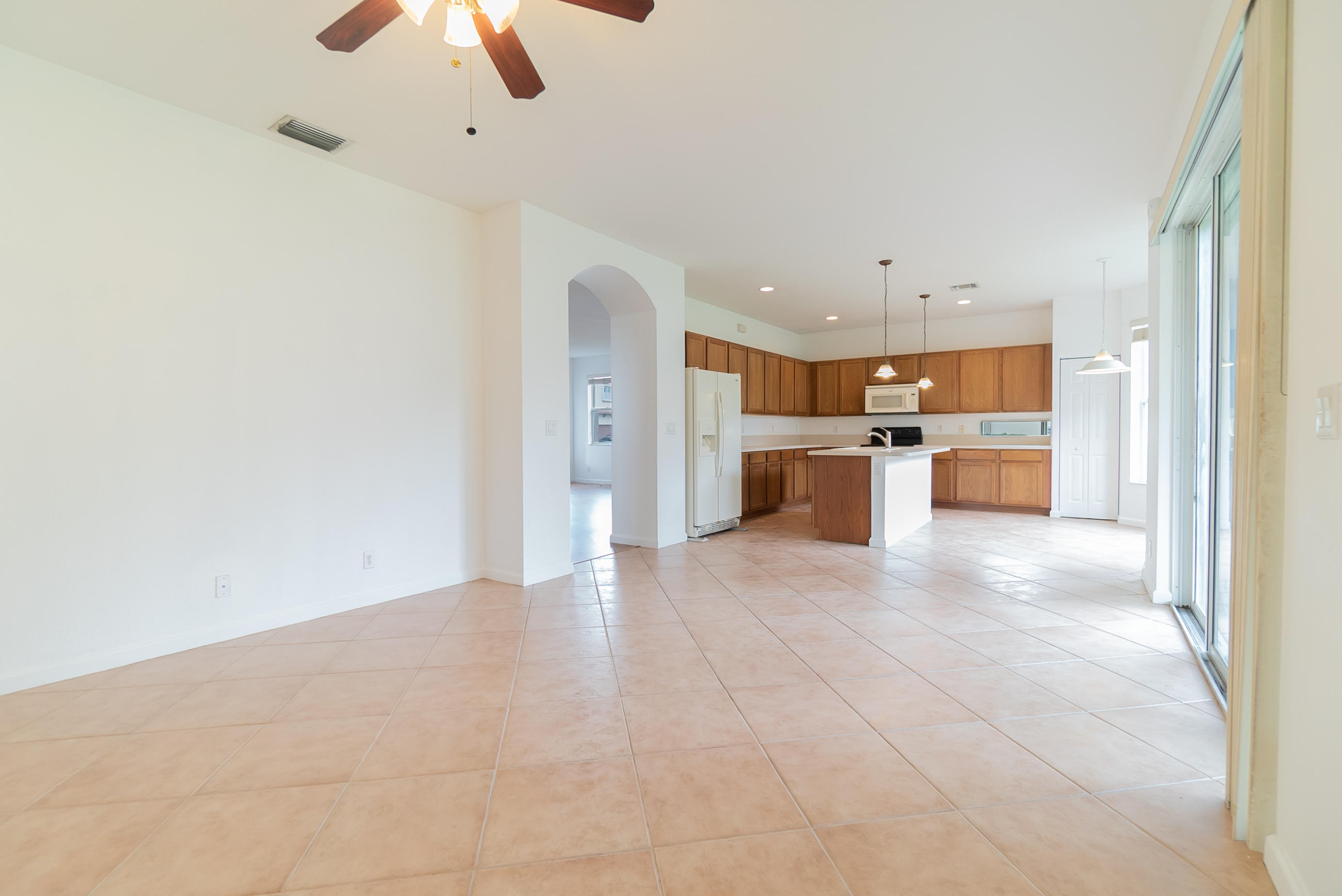 1232 Rose Gate Boulevard Riviera Beach, FL 33404 - Photo 12 of 23 10. Family Room_Kitchen