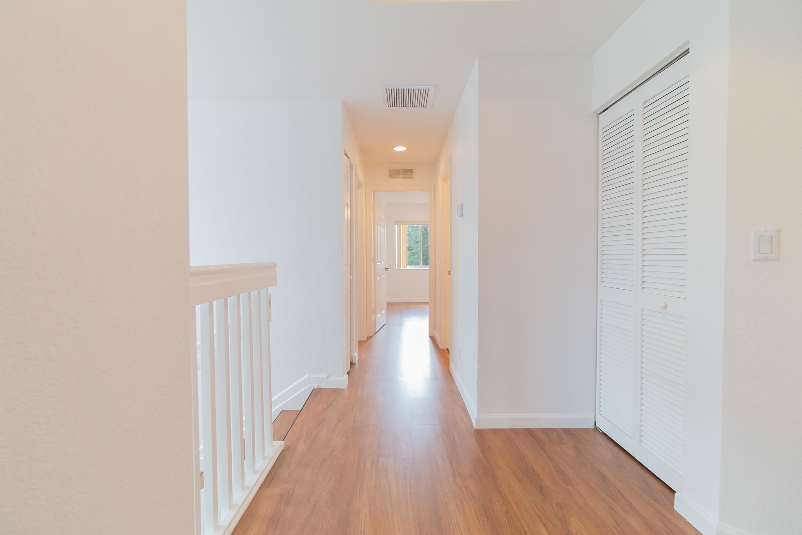 1232 Rose Gate Boulevard Riviera Beach, FL 33404 - Photo 14 of 23 12. Upstairs Hallway