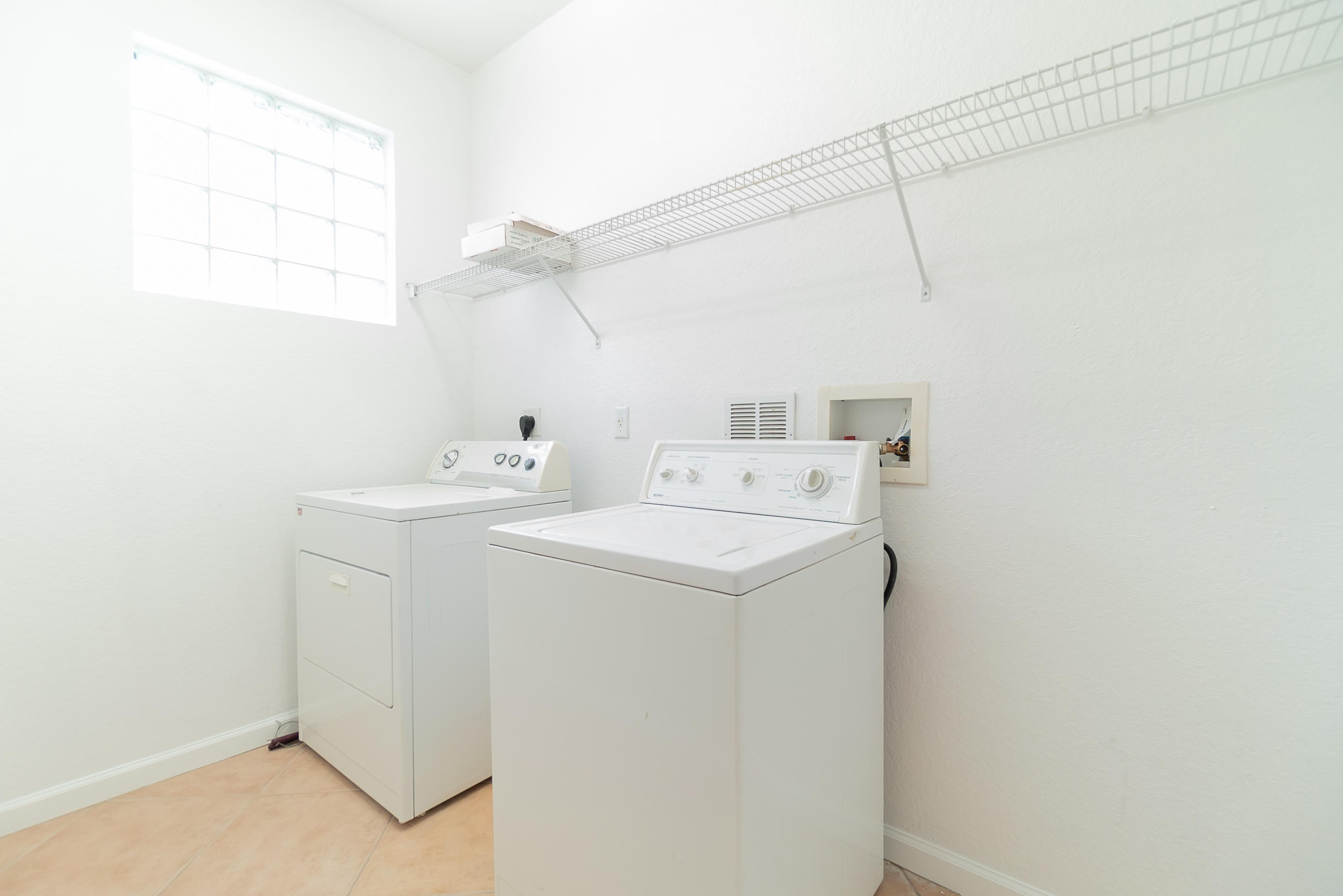 1232 Rose Gate Boulevard Riviera Beach, FL 33404 - Photo 23 of 23 21. Laundry Room