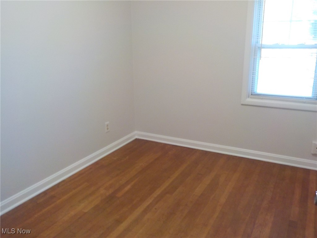 4031 Ardmore Road Cleveland, OH 44121 - Photo 14 of 19 Spare room with wood-type flooring