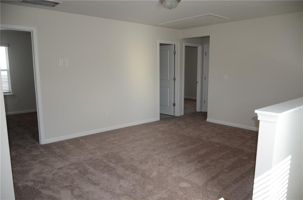 226 Wells Circle Canton, GA 30114 - Photo 25 of 27 a view of an empty room