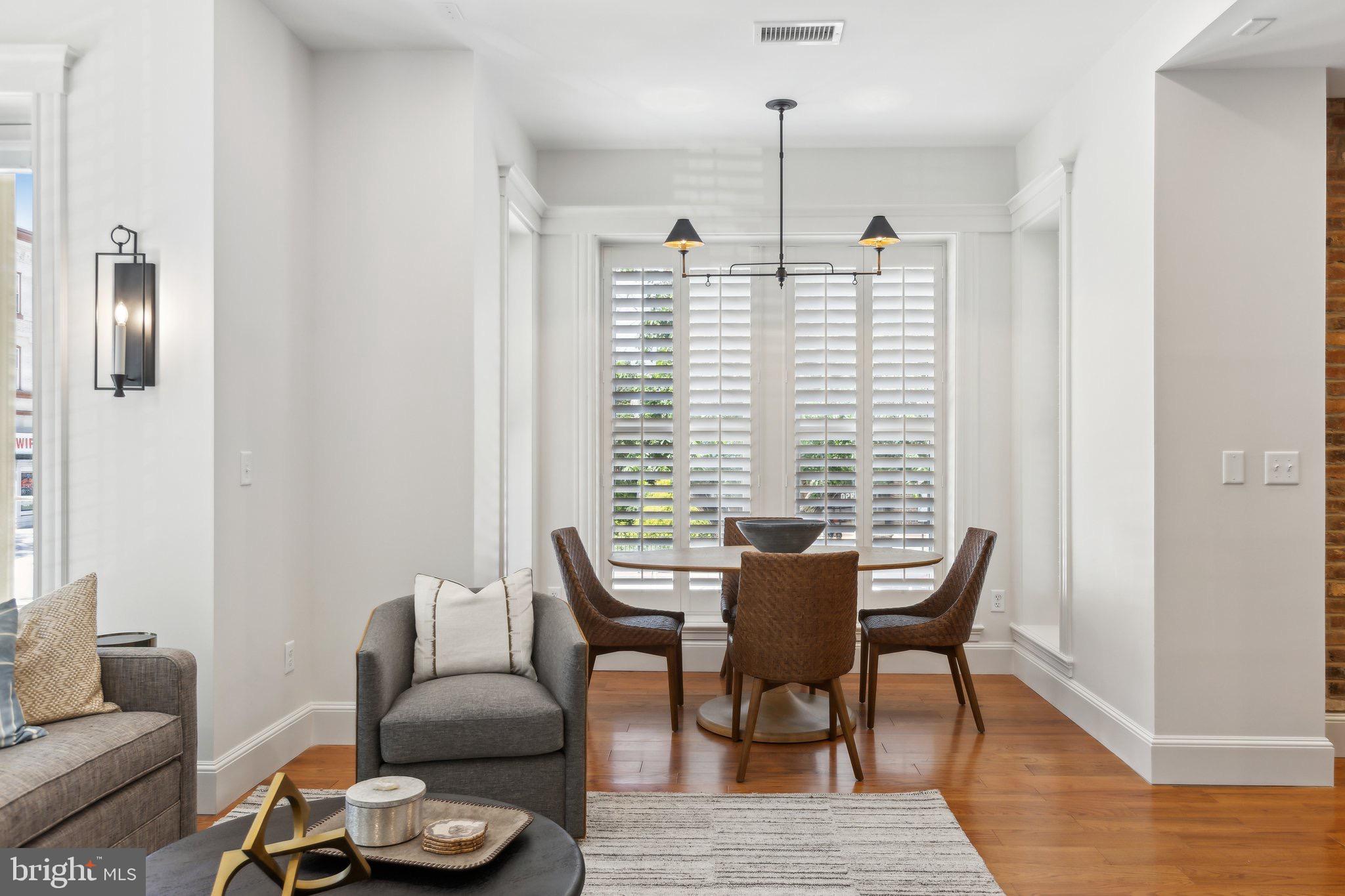1641 R Street Northwest, Unit 403 Washington, DC 20009 - Photo 4 of 36 Bright and airy dining space with modern charm.