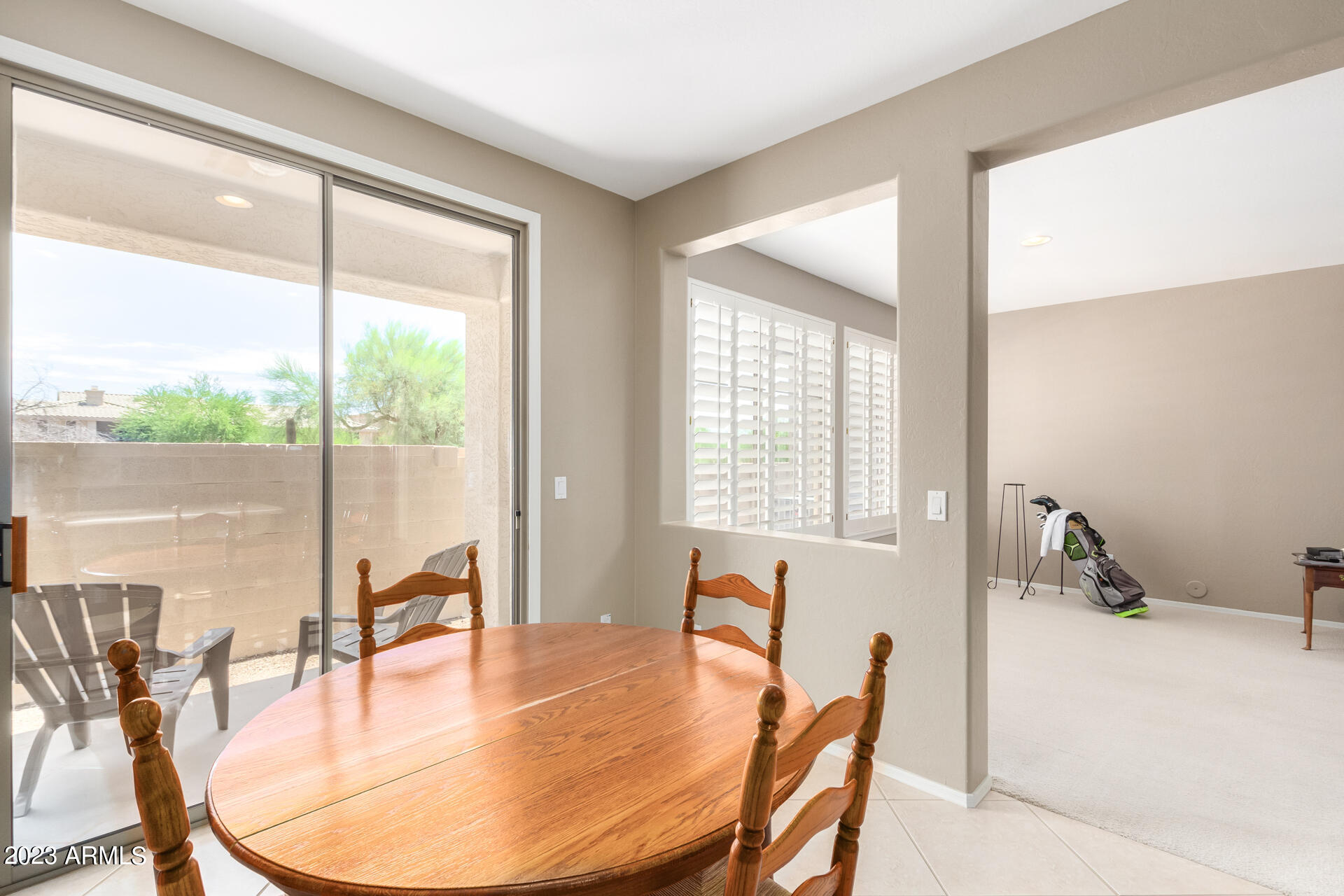 1024 East Frye Road, Unit 1014 Phoenix, AZ 85048 - Photo 16 of 29 a dining room with furniture and wooden floor