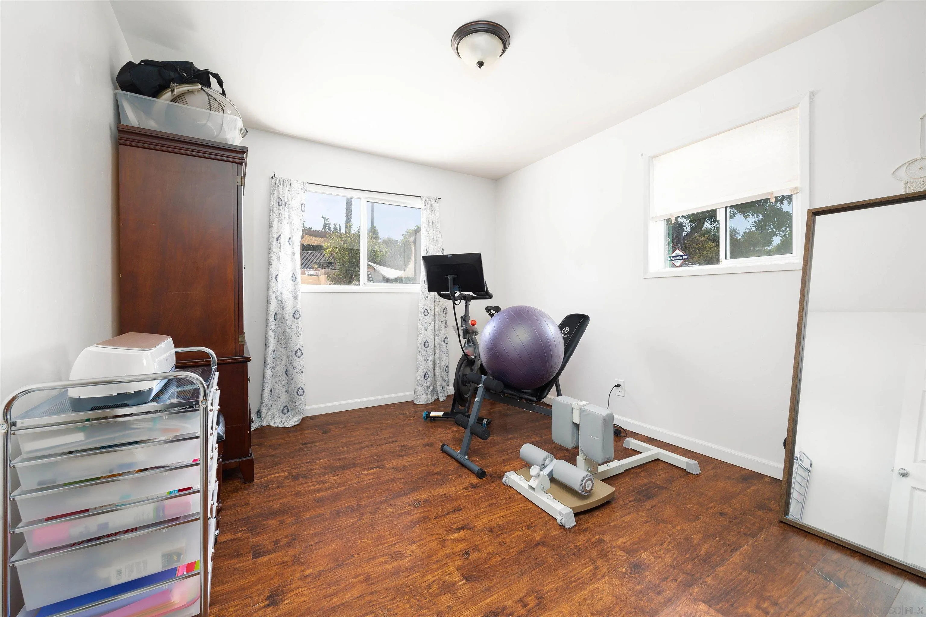10203 Settle Road Santee, CA 92071 - Photo 13 of 33 a workspace with furniture and a window