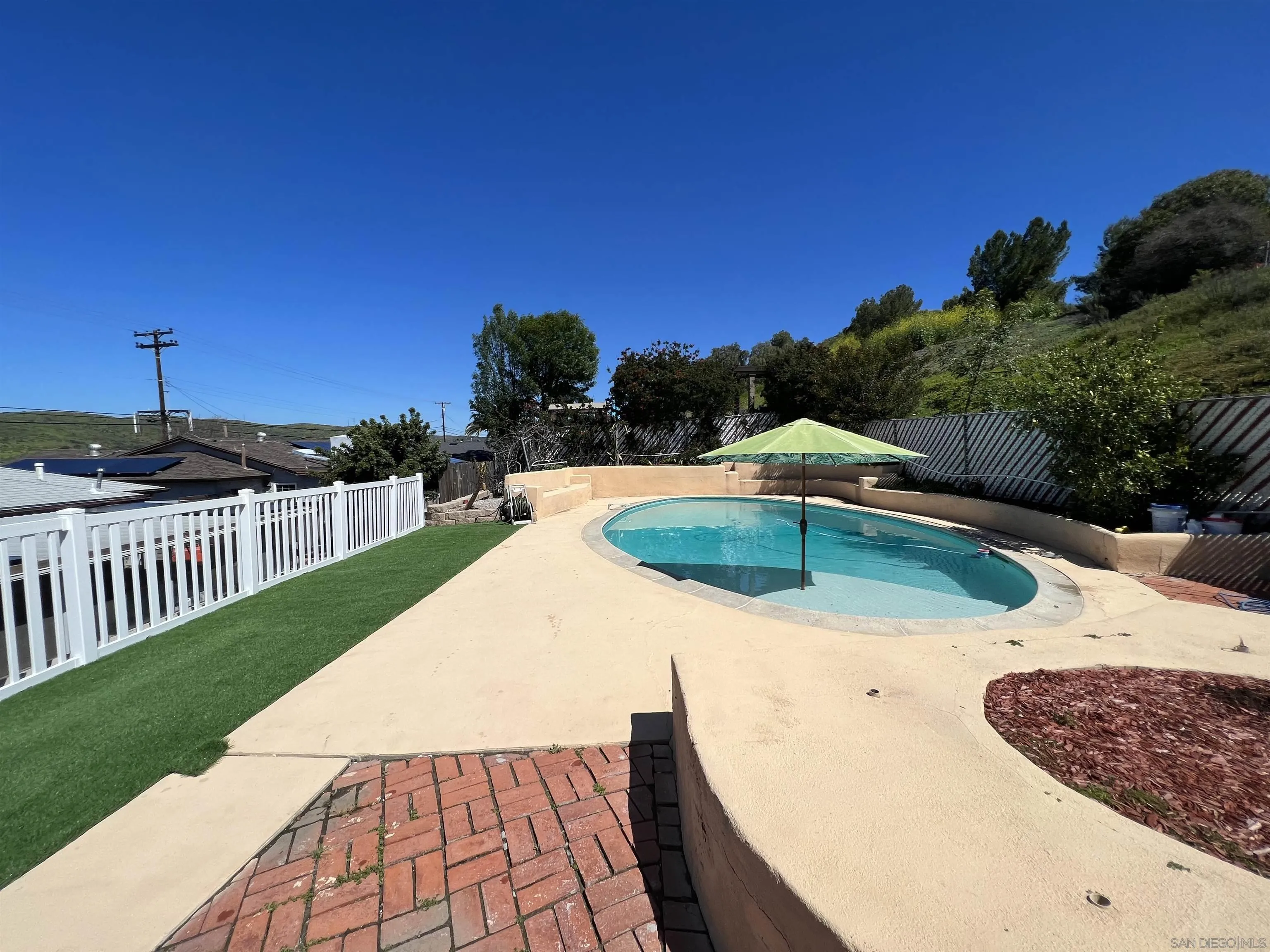 10203 Settle Road Santee, CA 92071 - Photo 29 of 33 a view of a backyard with sitting area