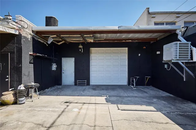 a view of a hallway with seating area