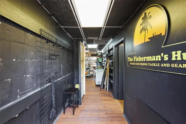 a hallway with wooden floor