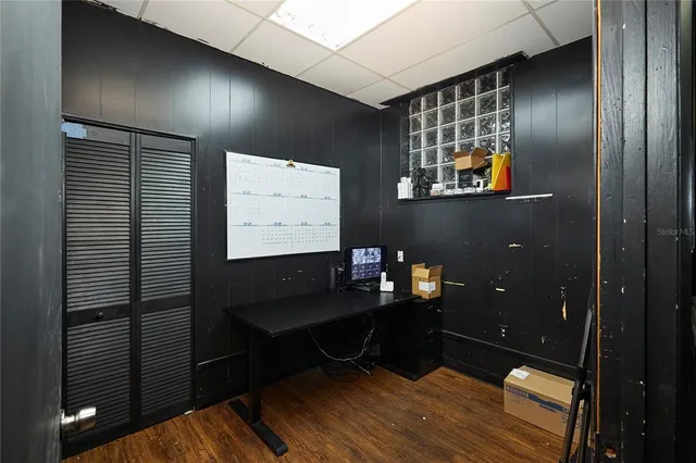 a workspace with furniture and window