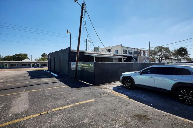 a car parked in front of a house