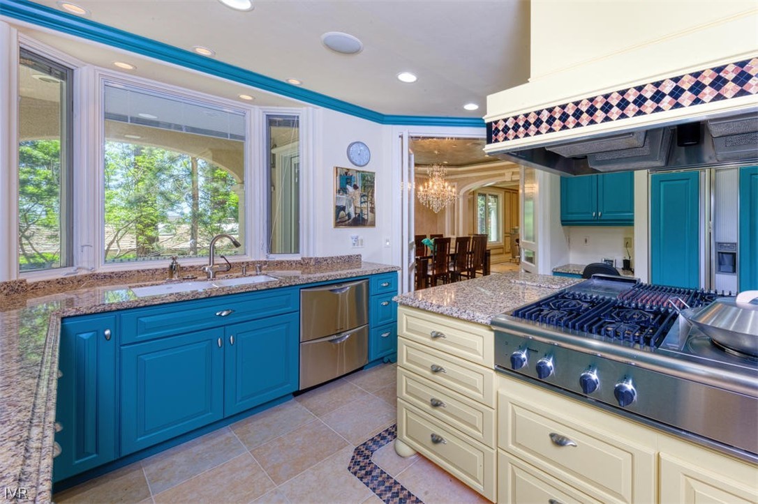 1580 Vivian Lane Incline Village, NV 89451 - Photo 13 of 35 a kitchen with a sink a counter space and a window