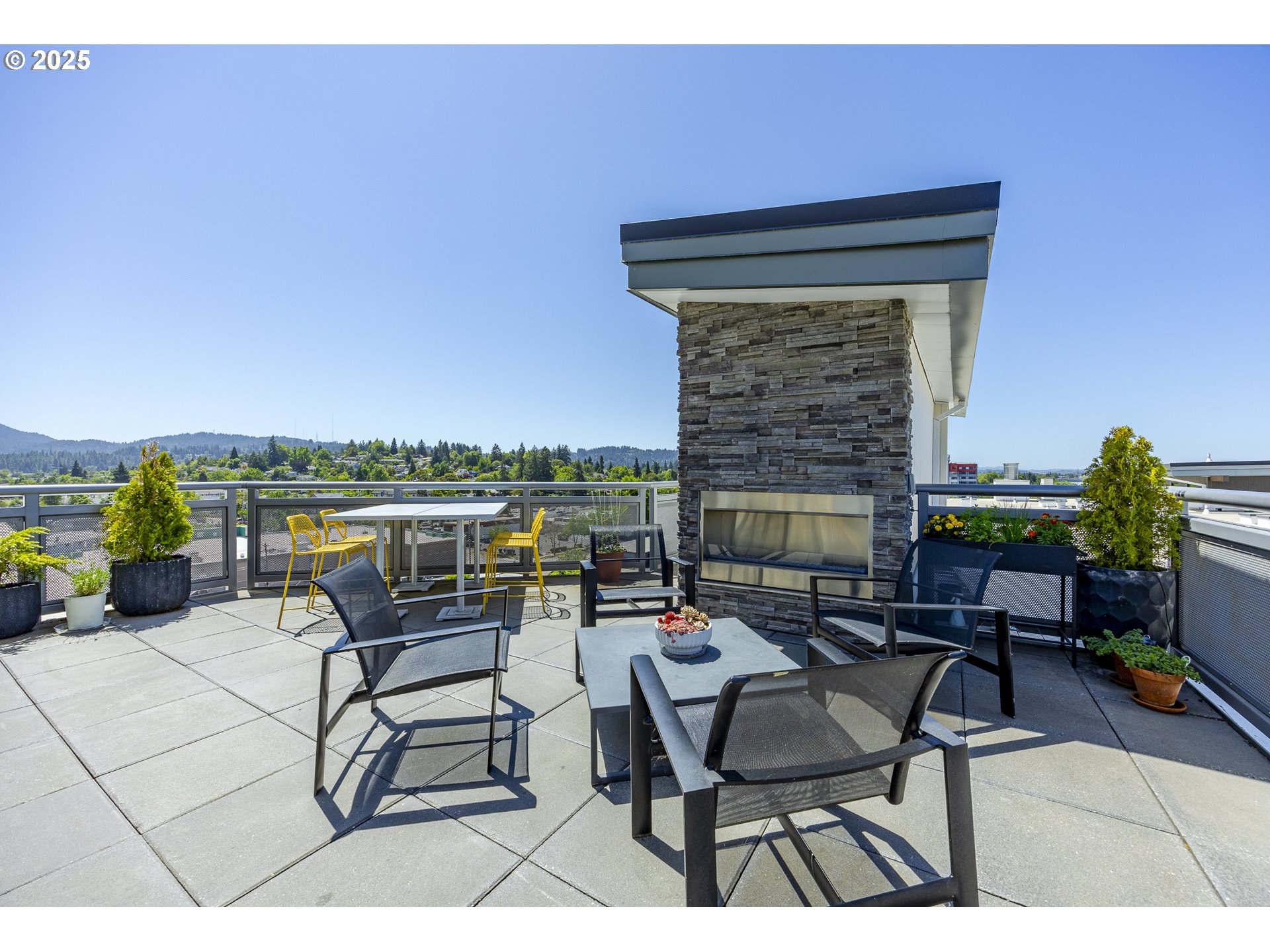 1600 Pearl Street, Unit 303 Eugene, OR 97401 - Photo 26 of 32 a terrace with outdoor seating and city view