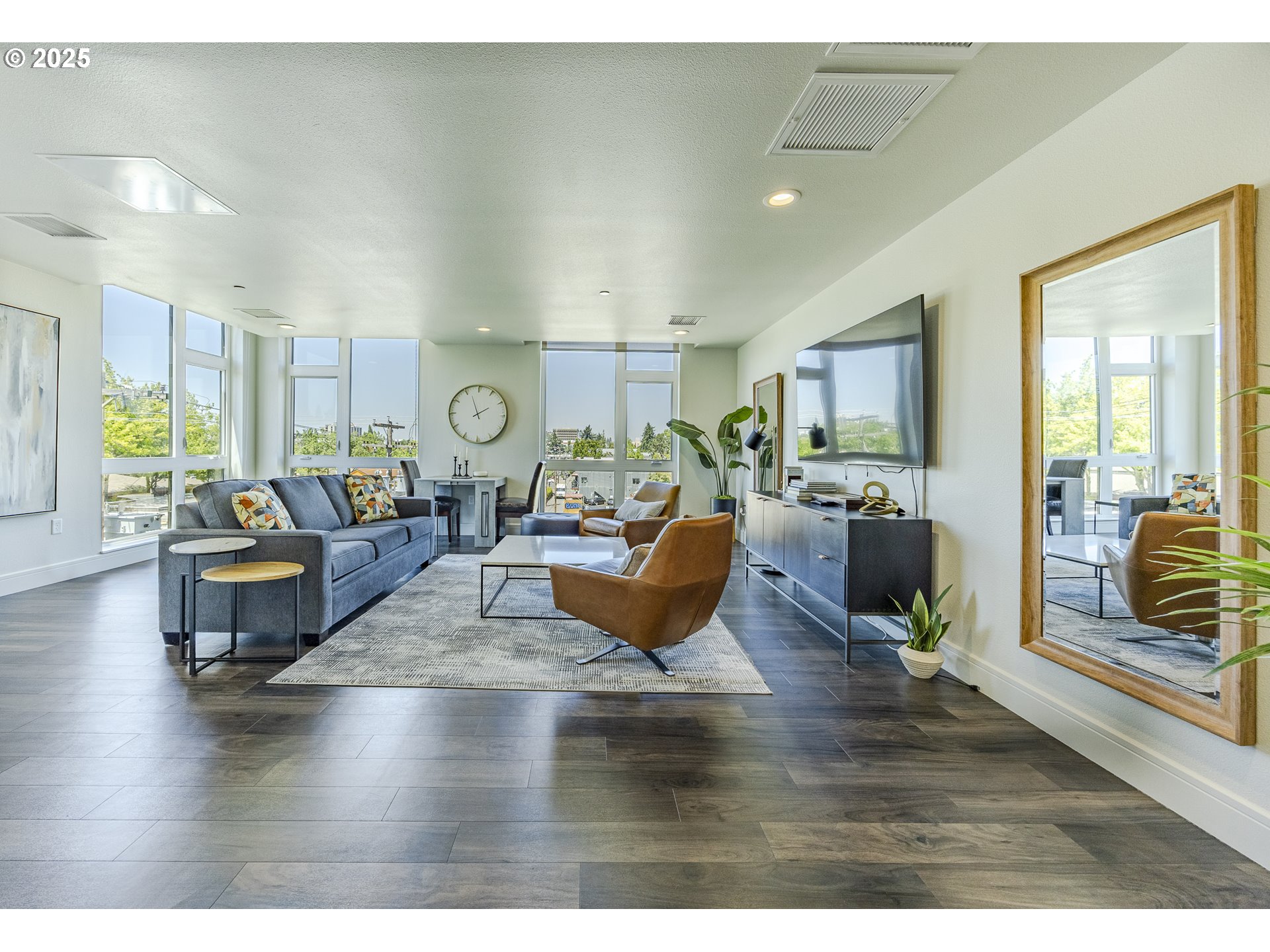 1600 Pearl Street, Unit 303 Eugene, OR 97401 - Photo 29 of 32 a living room with furniture kitchen view and a large window