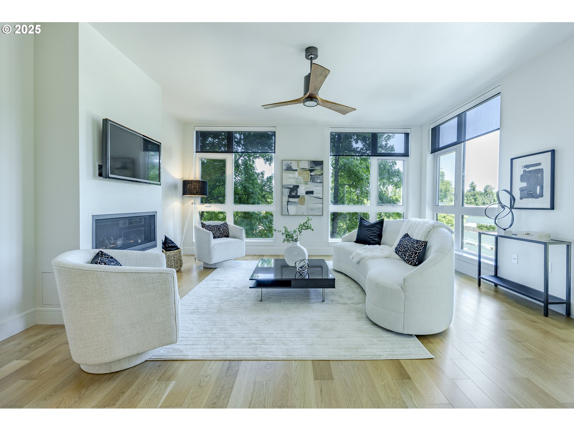 1600 Pearl Street, Unit 303 Eugene, OR 97401 - Photo 4 of 32 a living room with furniture and a large window