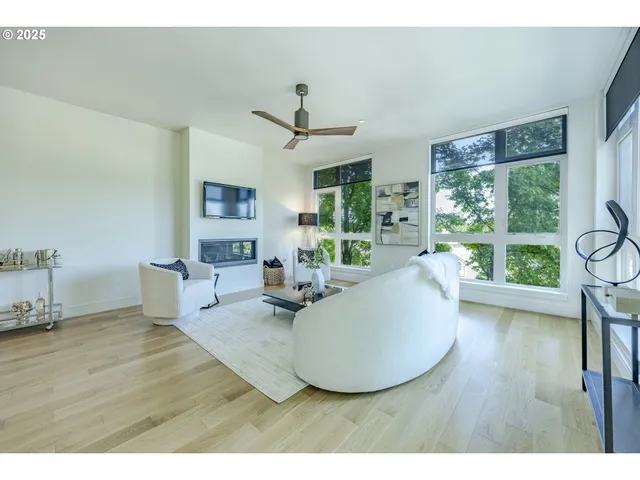 a view of a two chairs in the balcony
