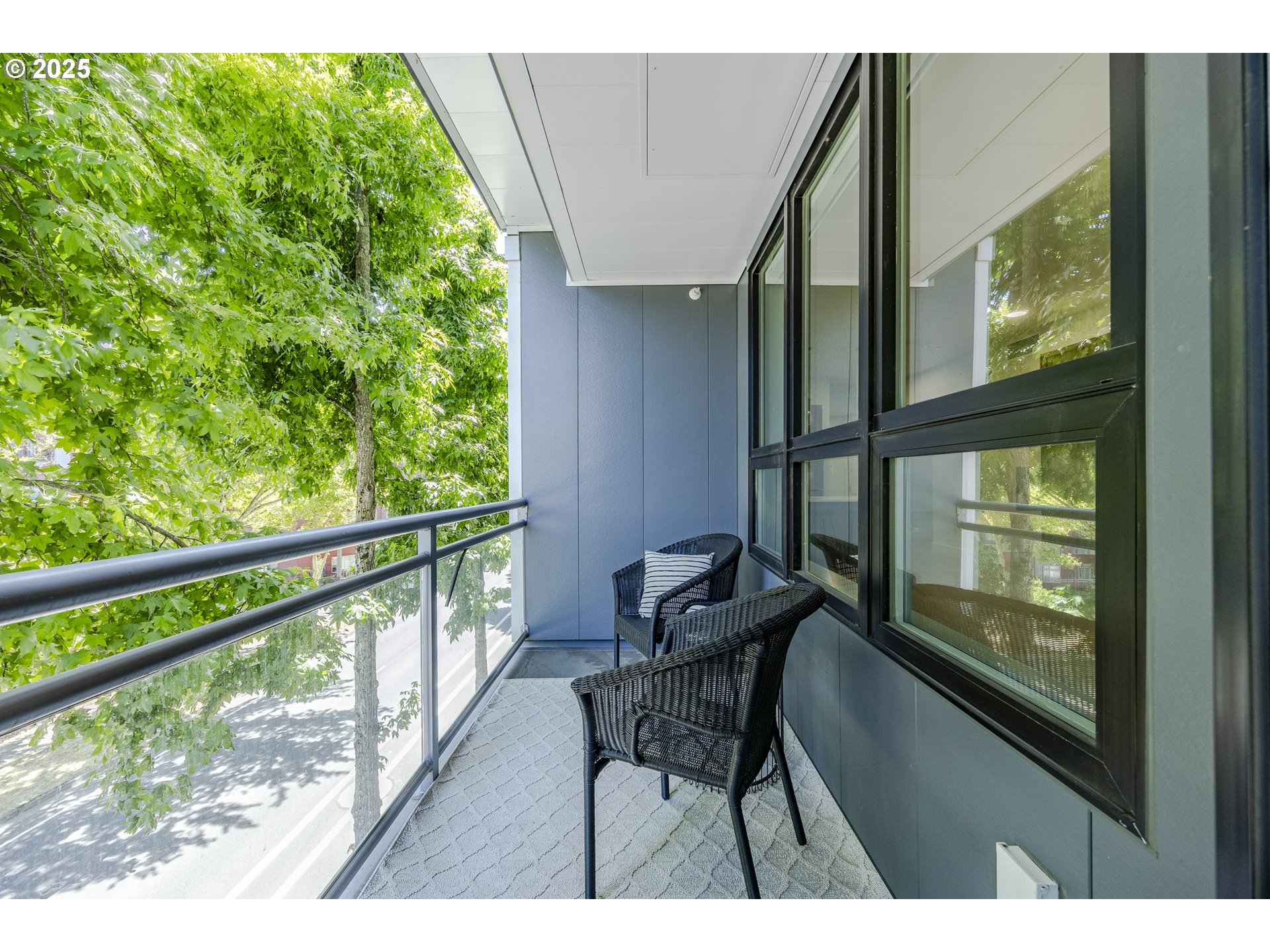 1600 Pearl Street, Unit 303 Eugene, OR 97401 - Photo 7 of 32 a view of a two chairs in the balcony