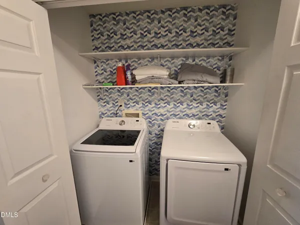 a view of a bathroom with a glass door