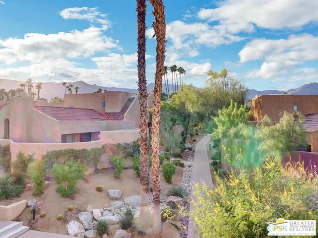 a view of a lake with a building in the background