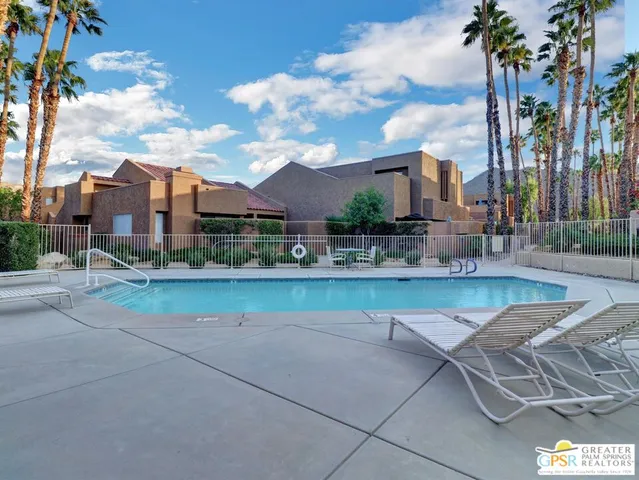 a view of a patio with a yard