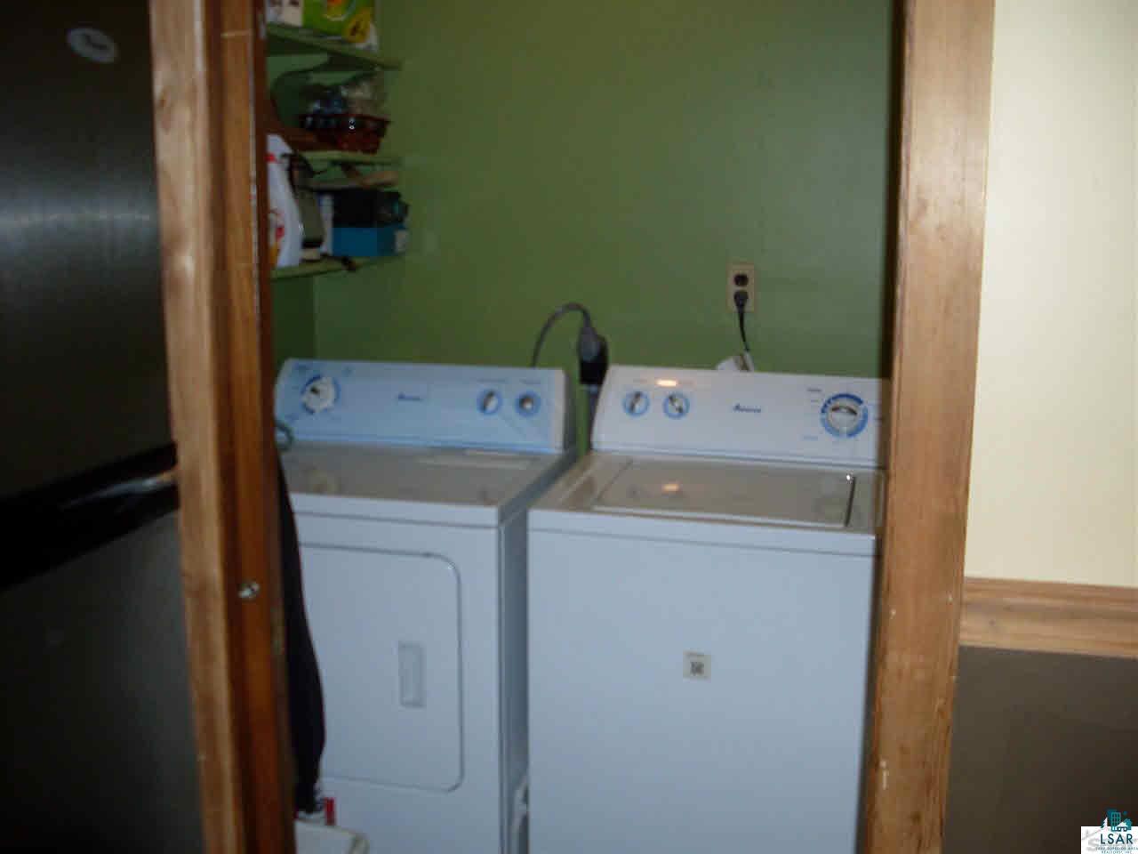 7098 South Steele Lake Road Lake Nebagamon, WI 54849 - Photo 15 of 25 Main level laundry