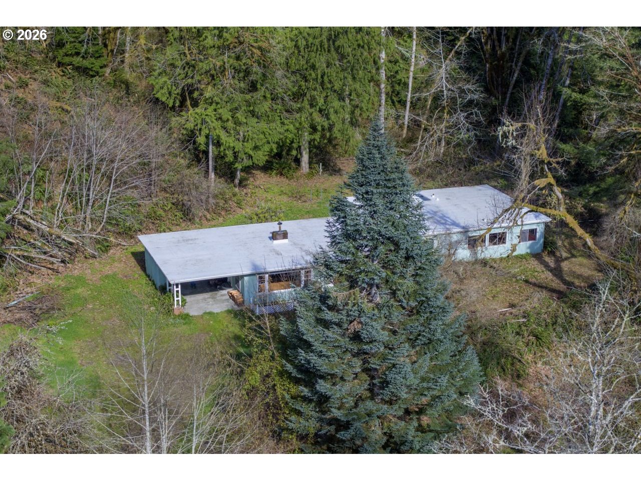 90136 Green Creek Road Swisshome, OR 97480 - Photo 9 of 42 a aerial view of a house with a yard