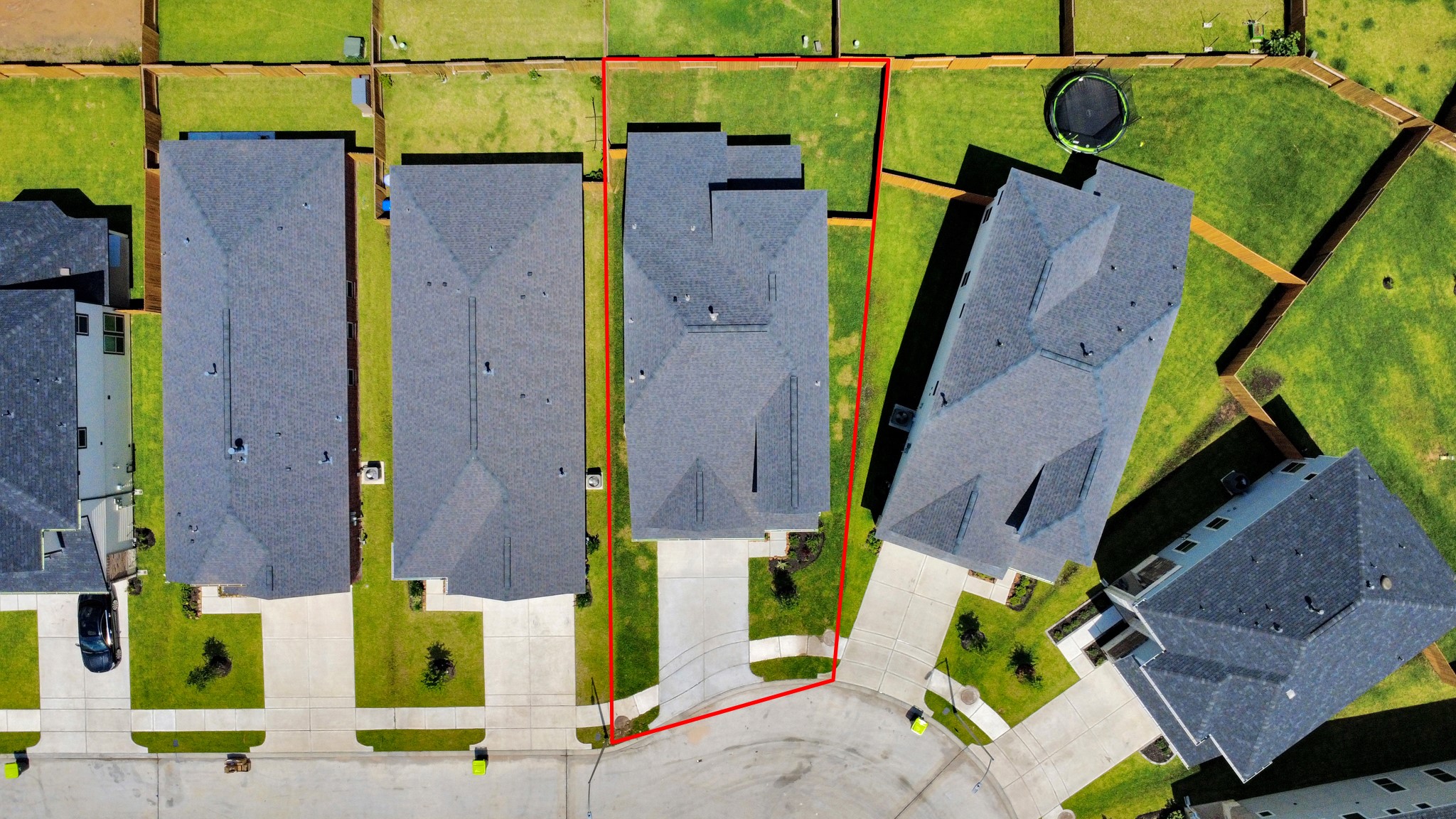 15523 Fathom Line Way Houston, TX 77053 - Photo 3 of 39 Aerial view highlighting the home outlined in red, featuring a modern exterior, dark roof, private driveway, and spacious backyard, ideally situated on a cul-de-sac.