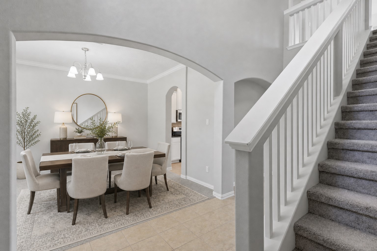 25926 Morgan Springs Spring, TX 77373 - Photo 5 of 49 From the foyer, enjoy an impressive view of the sweeping staircase, soaring ceilings, and open-concept design that creates a seamless flow between the formal dining room and the main living areas while filling the home with natural light. **Photo is Virtually Staged**