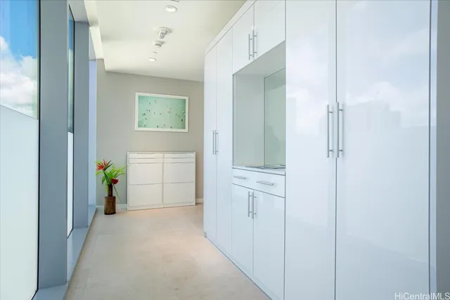 a view of hallway with wooden floor