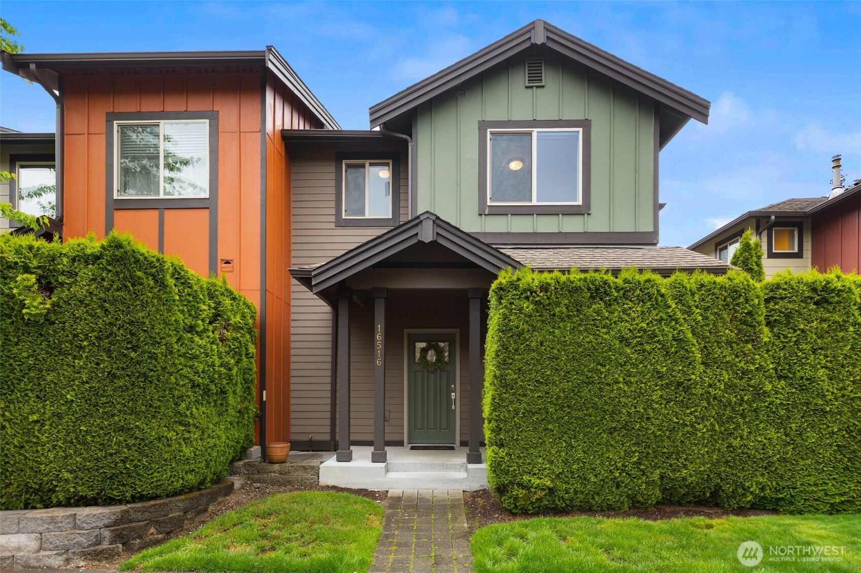 16516 2nd Park Southeast Bothell, WA 98012 - Photo 2 of 39 a front view of a house with garden