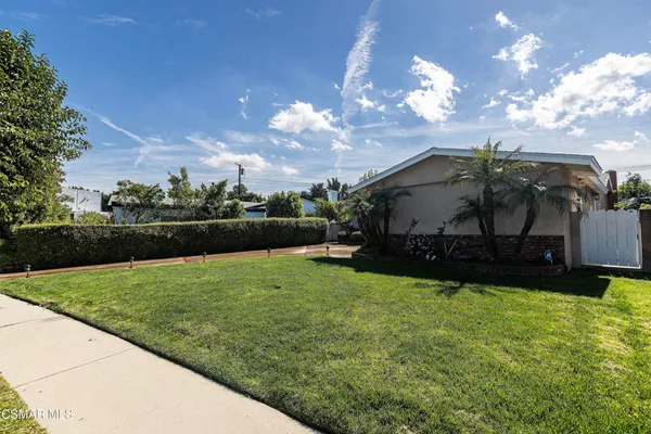 a view of outdoor space with garden and entertaining space