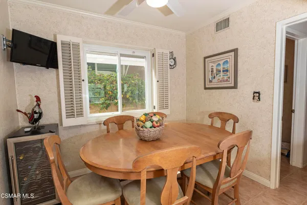 a view of a dining room with furniture