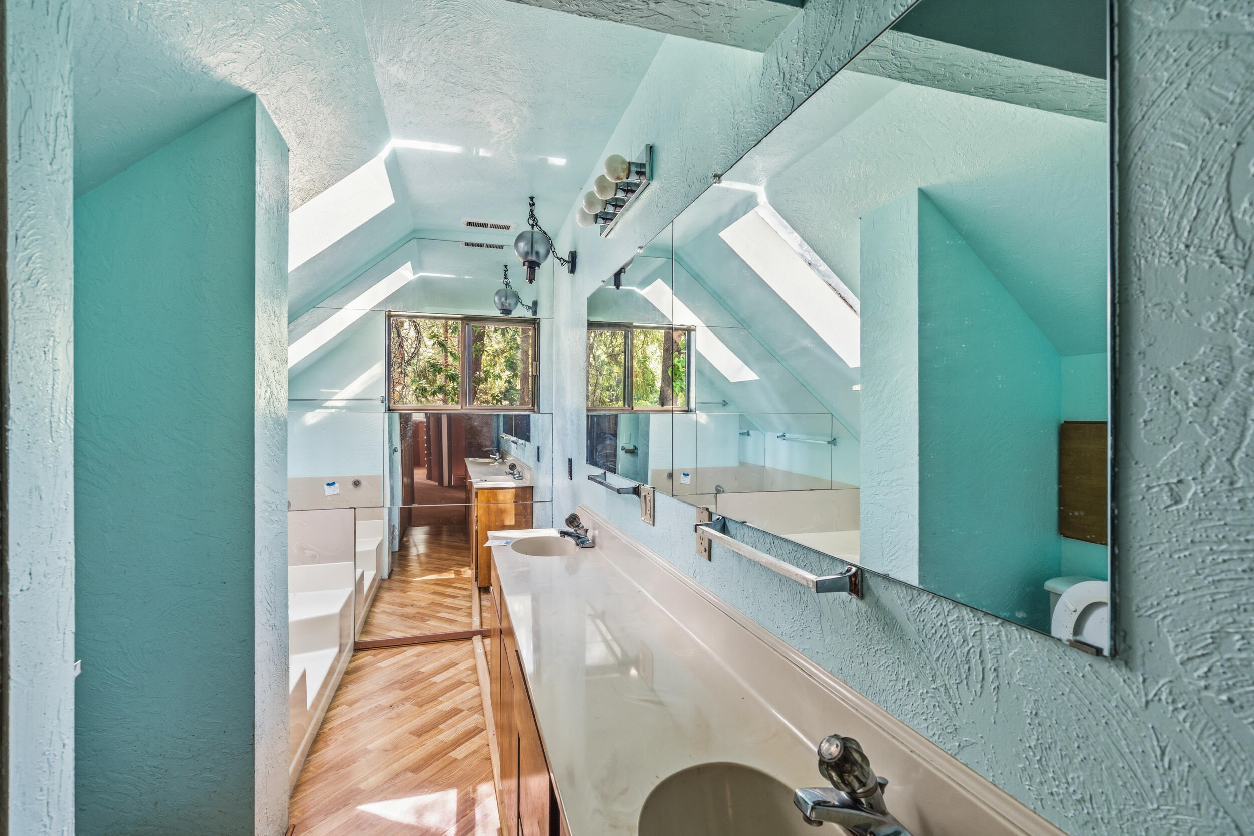 3300 West Evans Creek Road Rogue River, OR 97537 - Photo 13 of 21 a bathroom with a tub and a large window