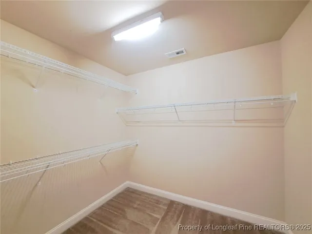 a view of a room with racks on the wall