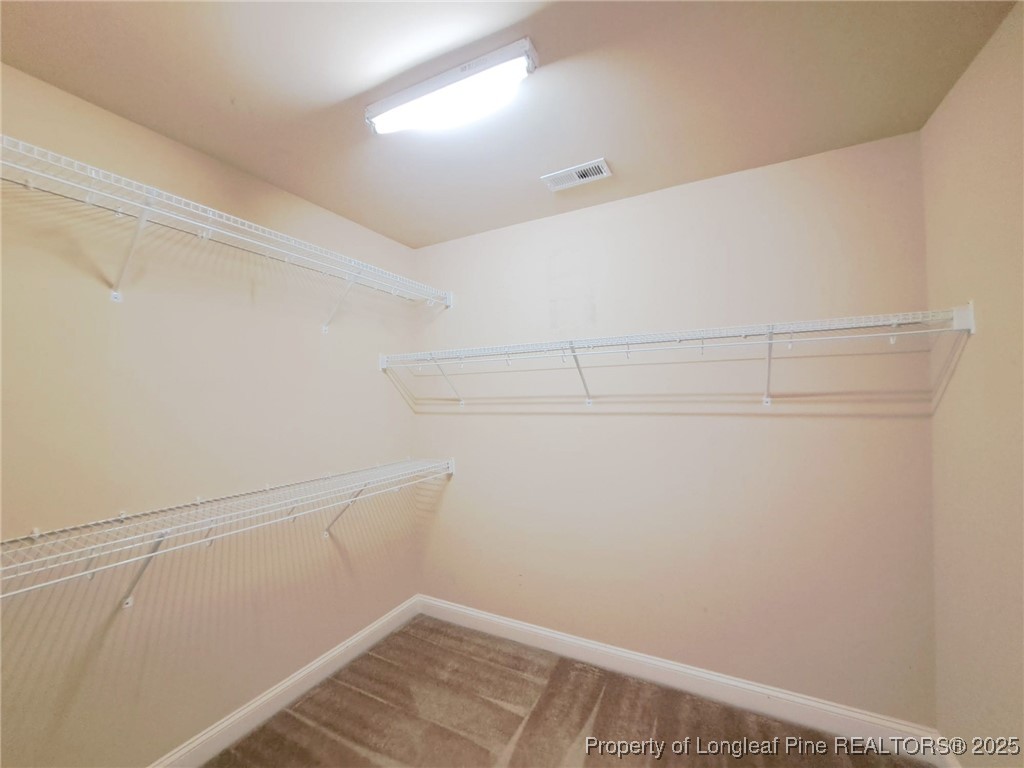 30 Appomattox Drive Cameron, NC 28326 - Photo 14 of 22 a view of a room with racks on the wall