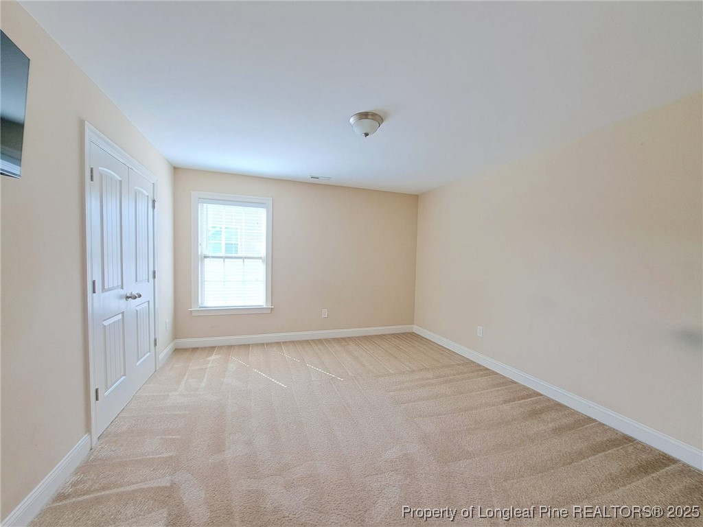 30 Appomattox Drive Cameron, NC 28326 - Photo 15 of 22 a view of an empty room with a window